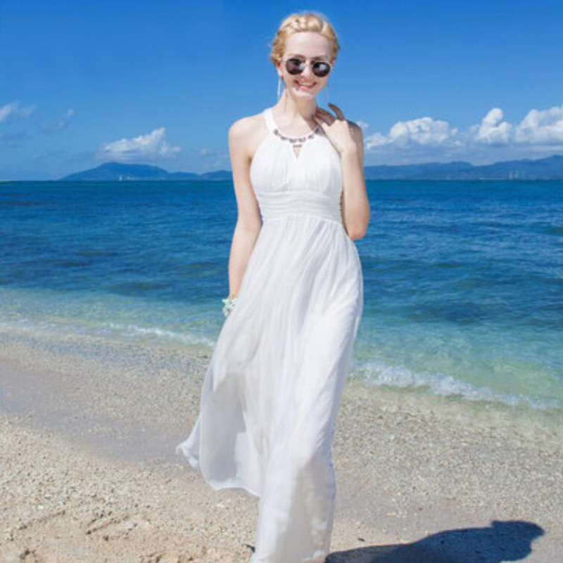 white dress on the beach